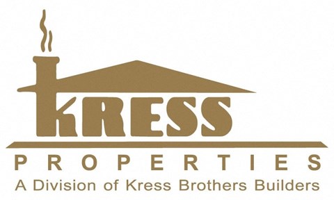 A logo for Kress Properties, a division of Kress Brothers Builders, featuring a stylized house with a chimney.