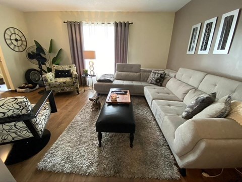 a living room with a couch and a table