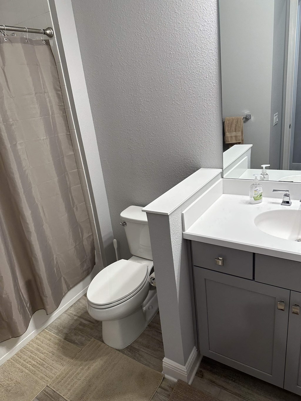 a bathroom with a toilet and a sink