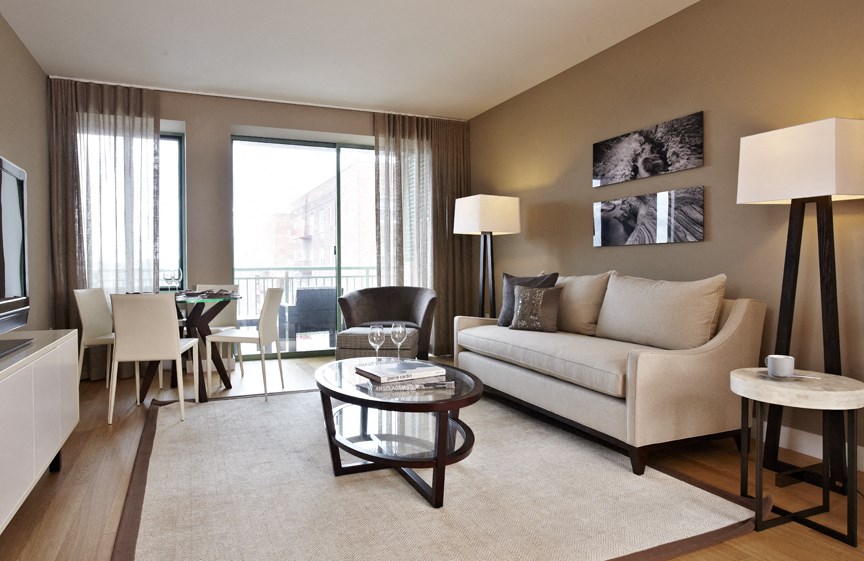 a living room with a couch and a table