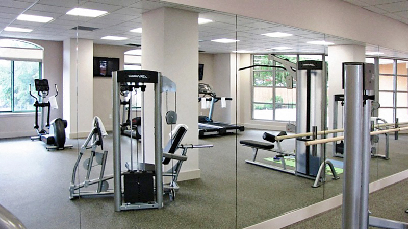 a gym with a lot of equipment in it