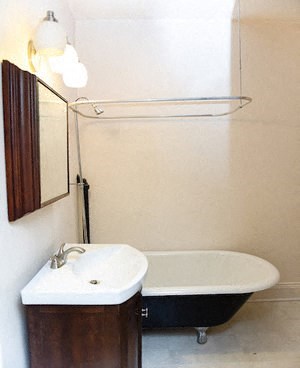 a bathroom with a sink and a bath tub