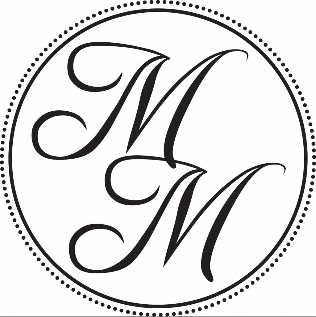 A black and white image of the letter M in a circle.