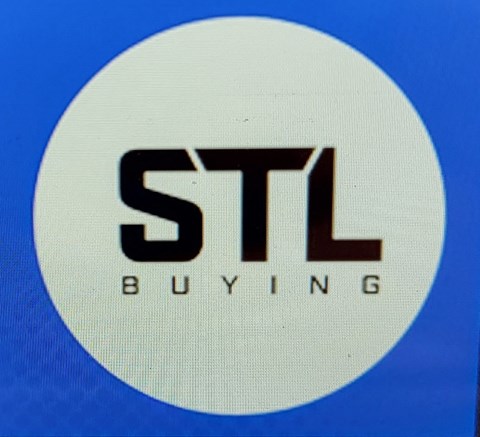 A sign with the letters STL and the word BUYING.