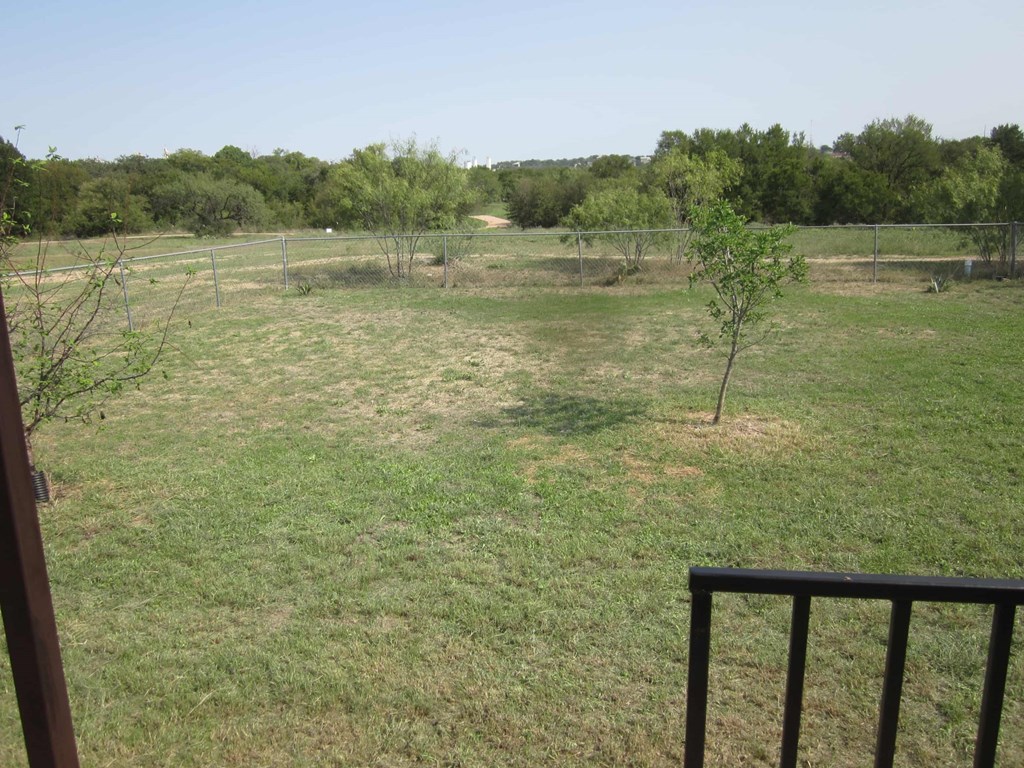 a view of the pasture from the porch of the house