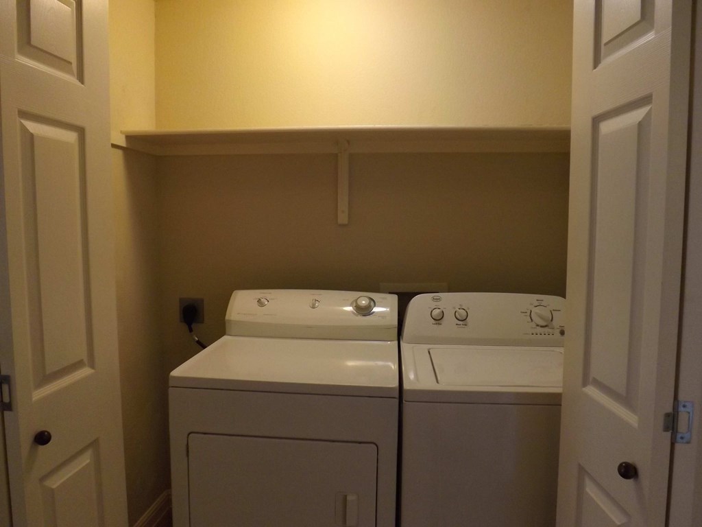 full size washer and dryer in the laundry room