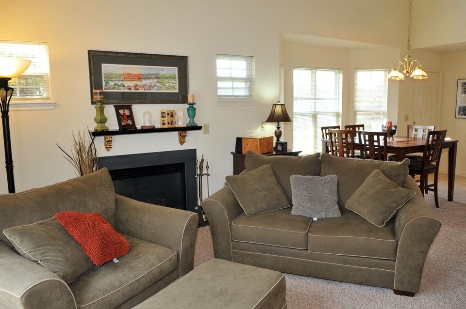 living room leads into dining room