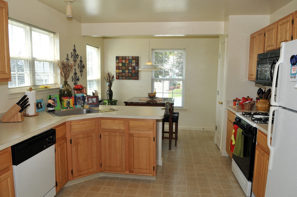 breakfast bar area by eat in kitchen