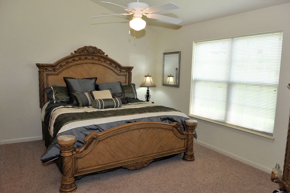 large master bedroom with master bath