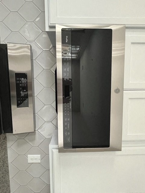 a microwave oven sitting on top of a counter