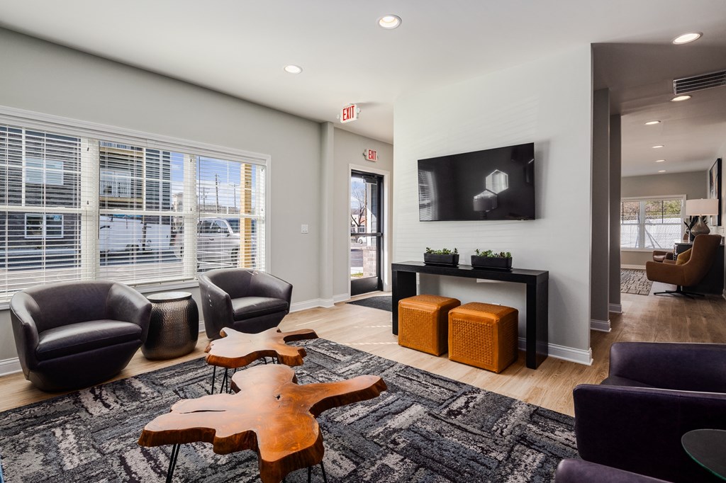 the residence on lamar apartment homes leasing office and living room