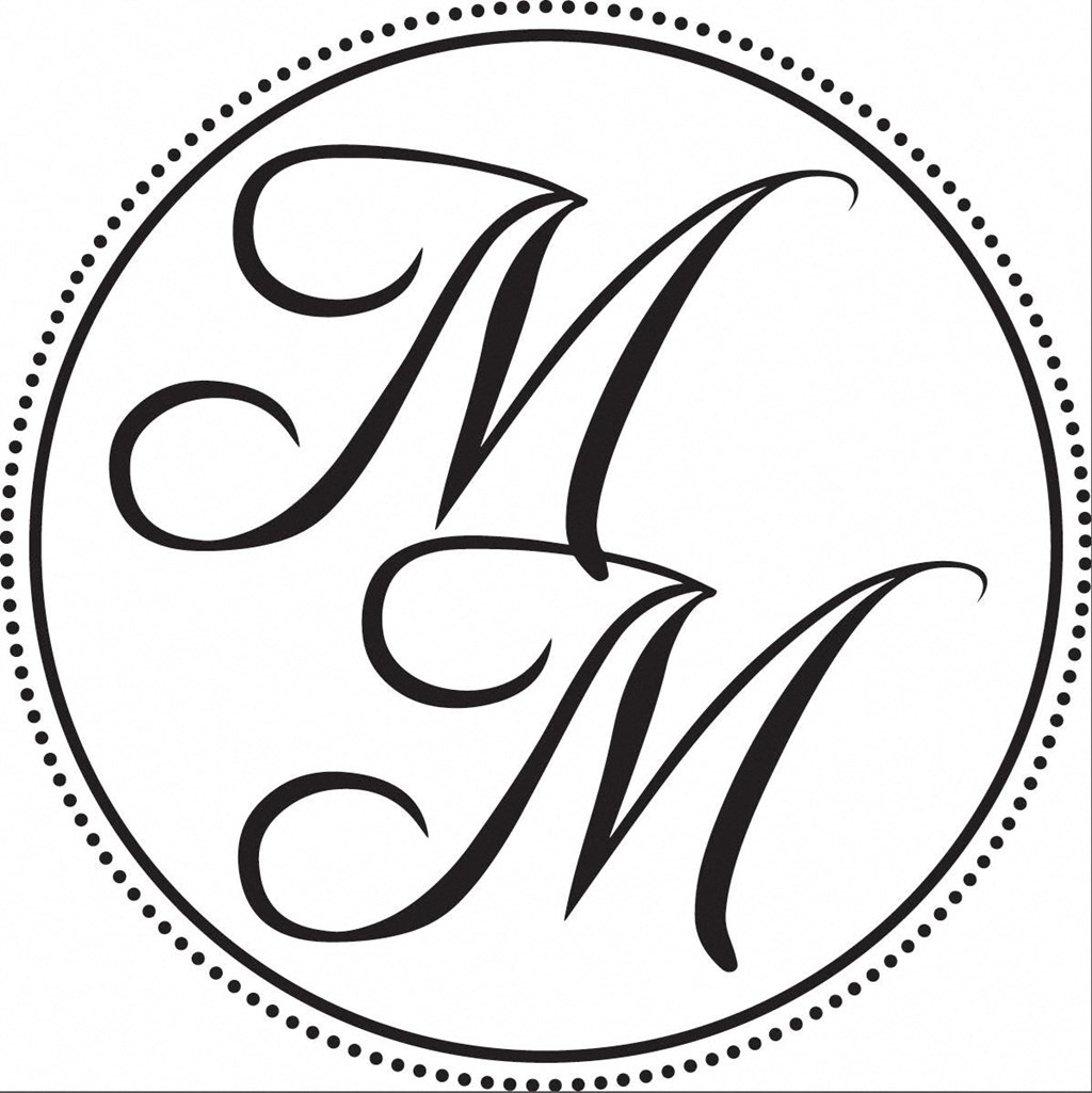 A black and white image of the letter M in a circle.