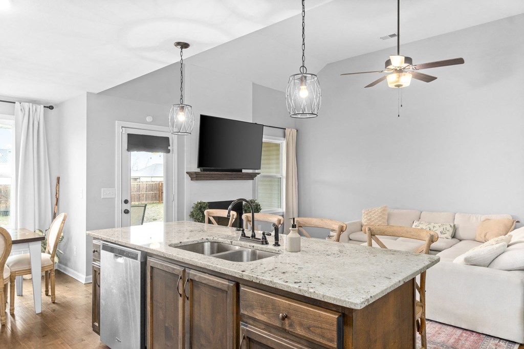a kitchen with a sink and a counter top