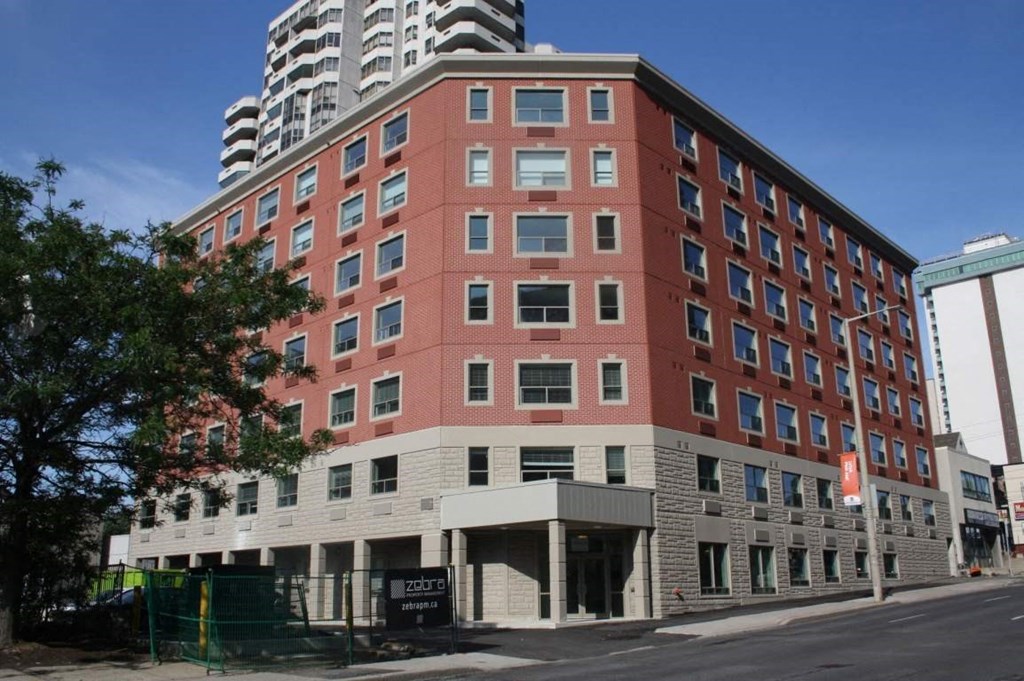 a building on the corner of a city street