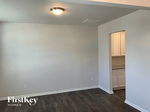 a empty room with white walls and a closet