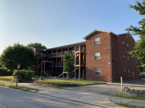 an apartment building is under construction with scaffolding