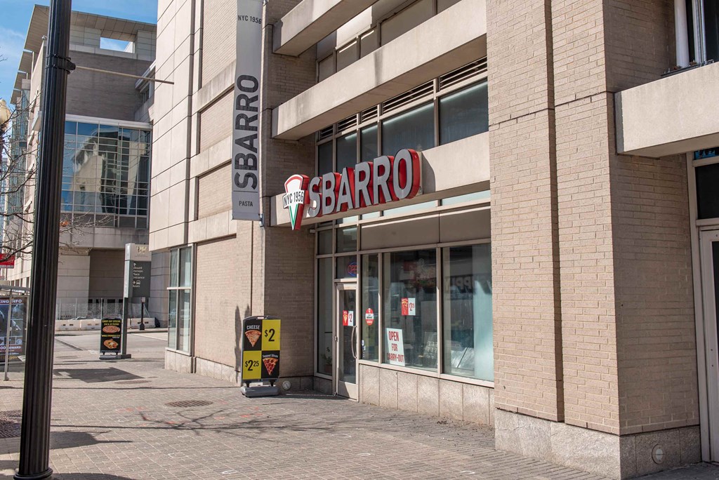 a barro store on the corner of a city street