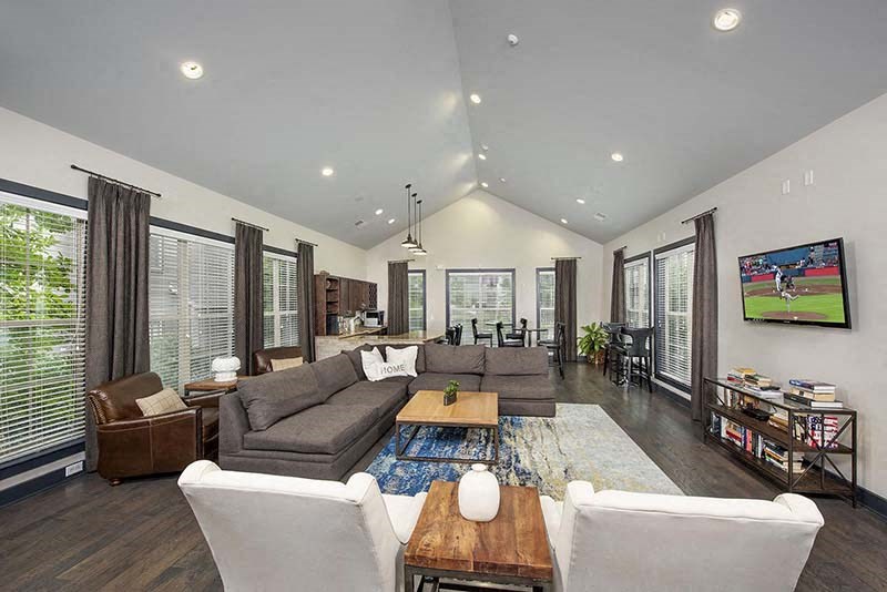 a living room with a couch and a tv