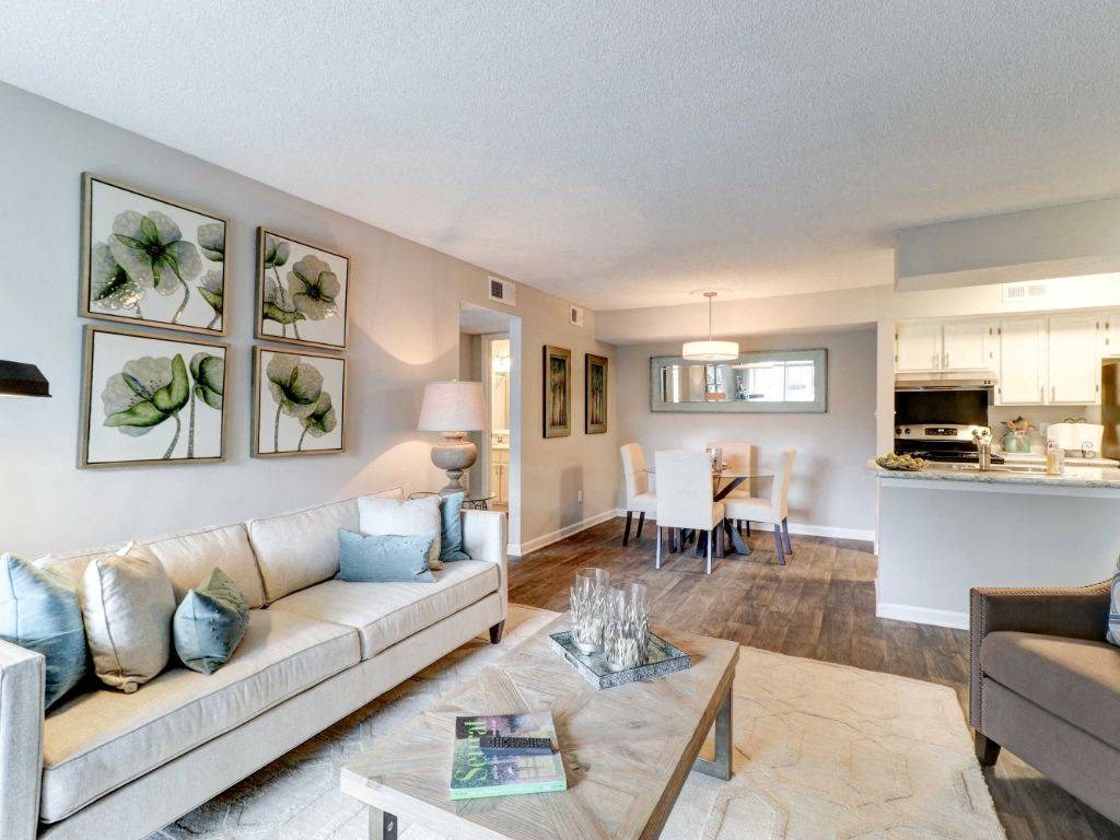 a living room with a couch and a table