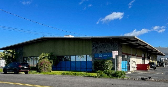 a building with a car parked in front of it