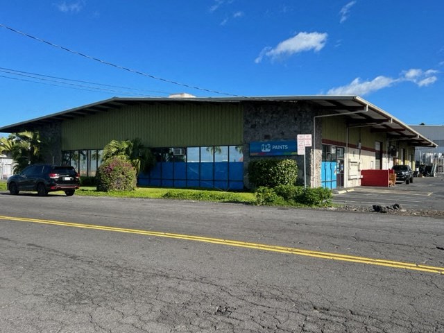 a building with a car parked in front of it