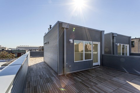 the roof terrace of the building has a view of the city
