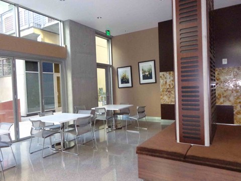 the dining area of the building has tables and chairs