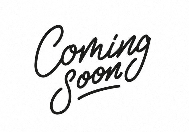 coming soon handwritten text on a white background