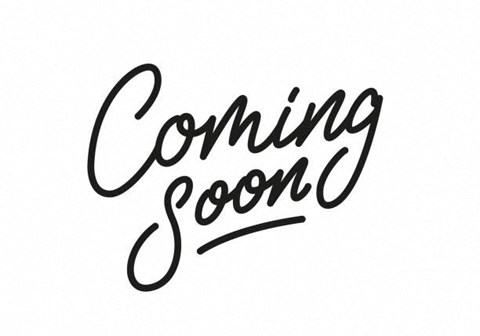 coming soon handwritten text on a white background