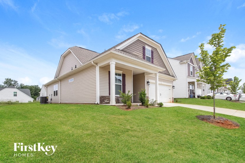 a house with a lawn in front of it