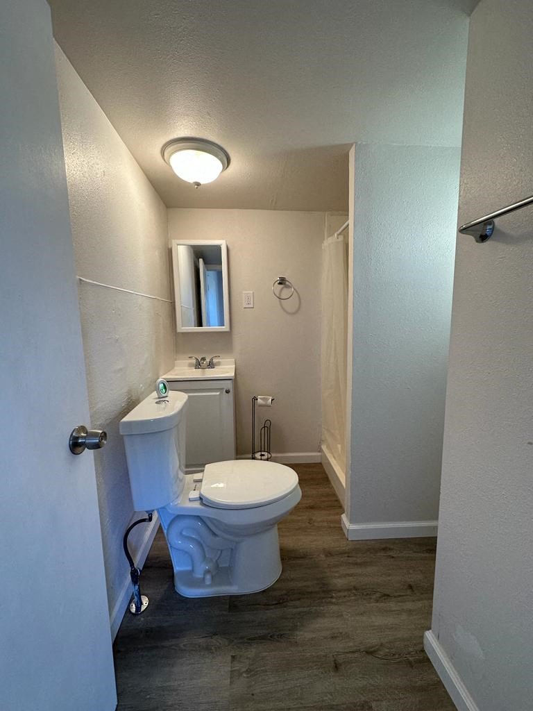 a small bathroom with a toilet and a sink
