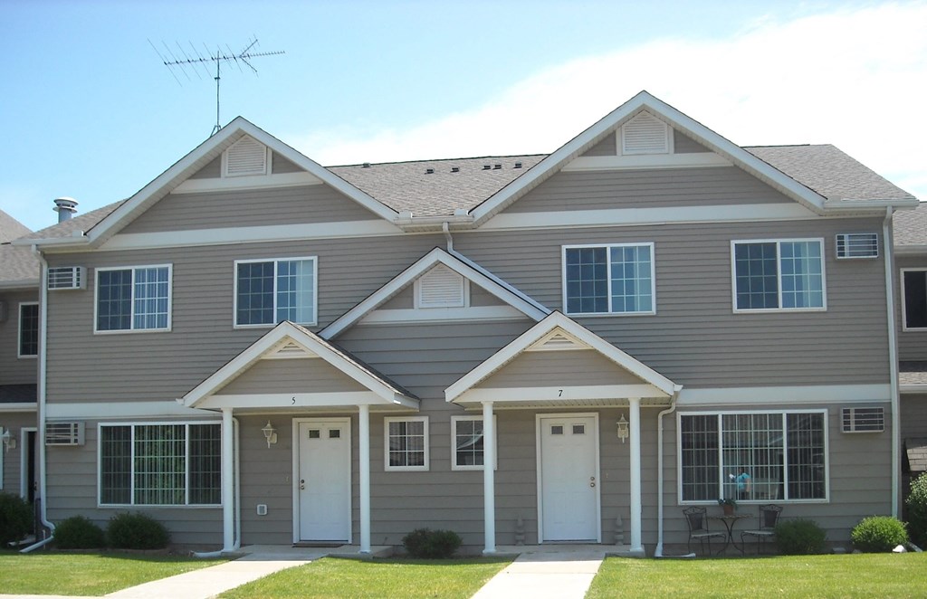 a large house with white doors and windows