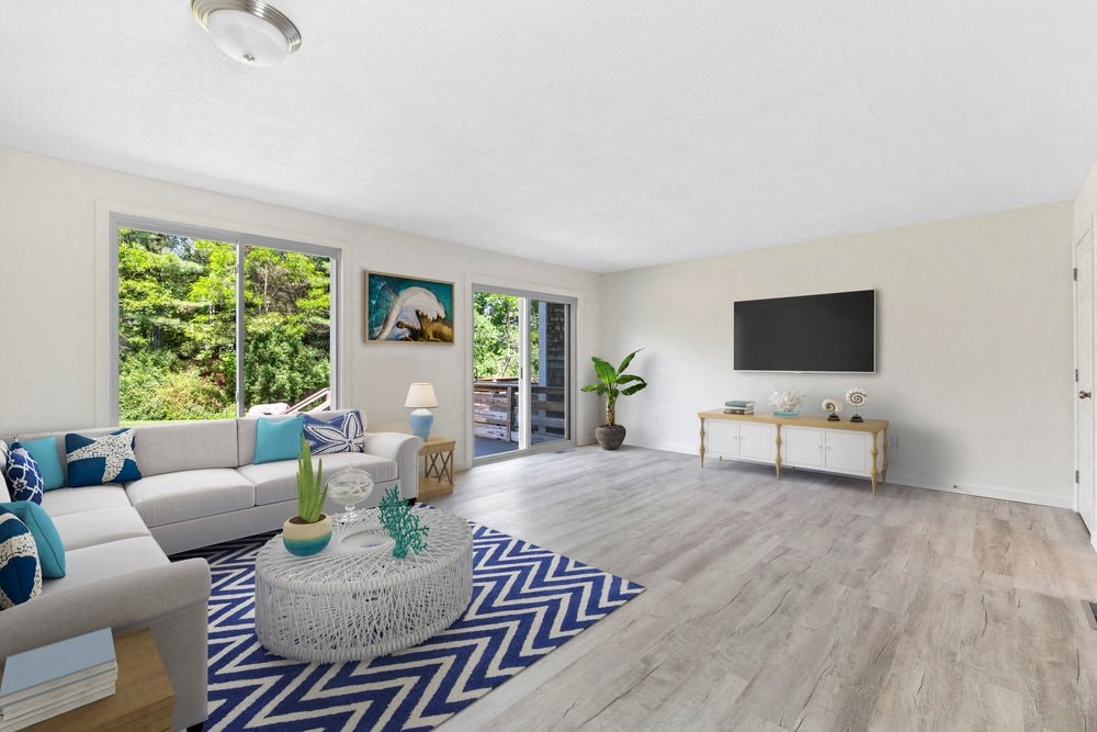 a living room with a couch and a tv