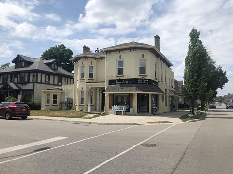 a building on the corner of a city street