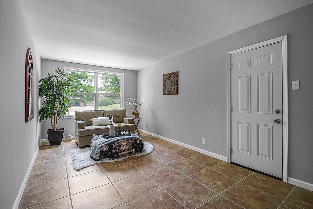 a living room with a couch and a table