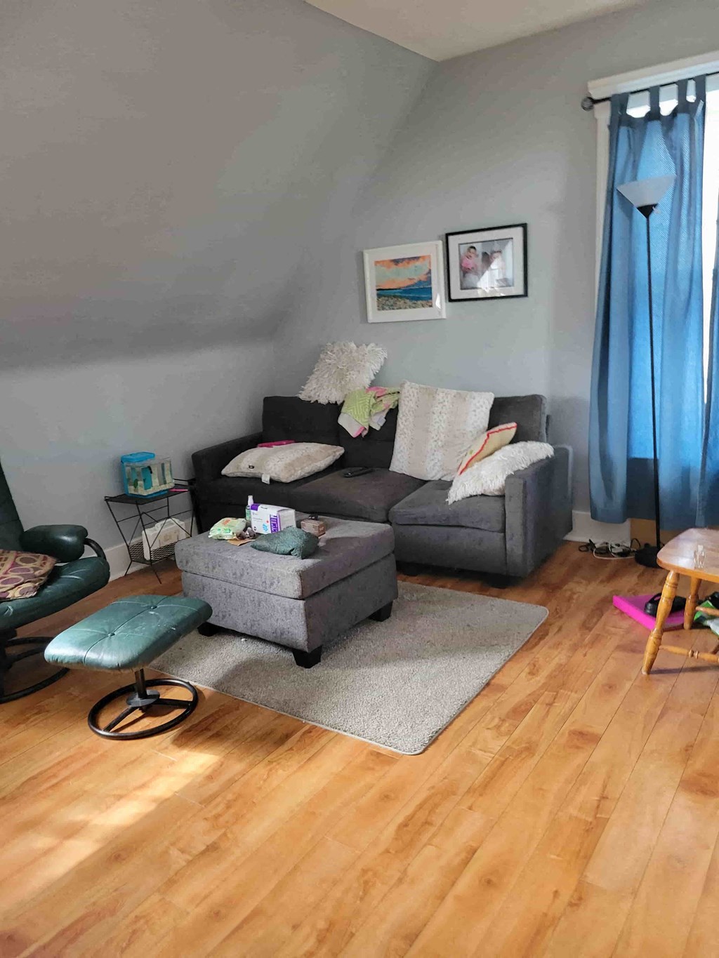 a living room with a couch and a chair