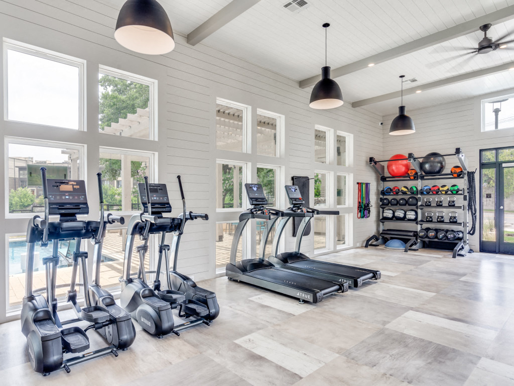 the gym is equipped with treadmills and other exercise equipment