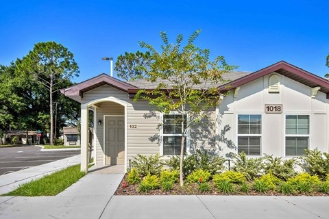 A small building with the number 102 on it.