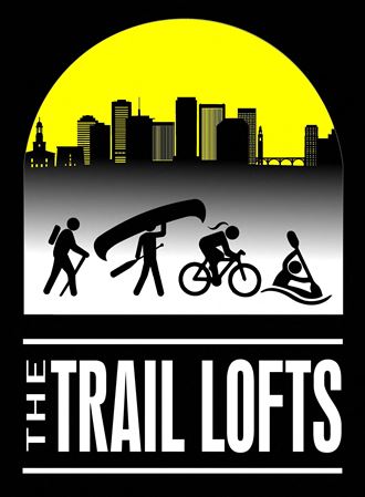 a poster for the trail lofts with silhouettes of people walking and biking