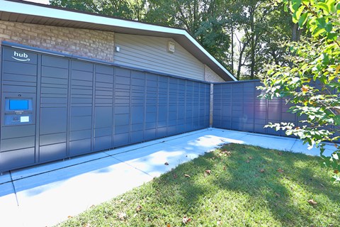the side of a garage with a blue wall