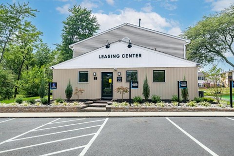 the leasing center is located in the parking lot of the building