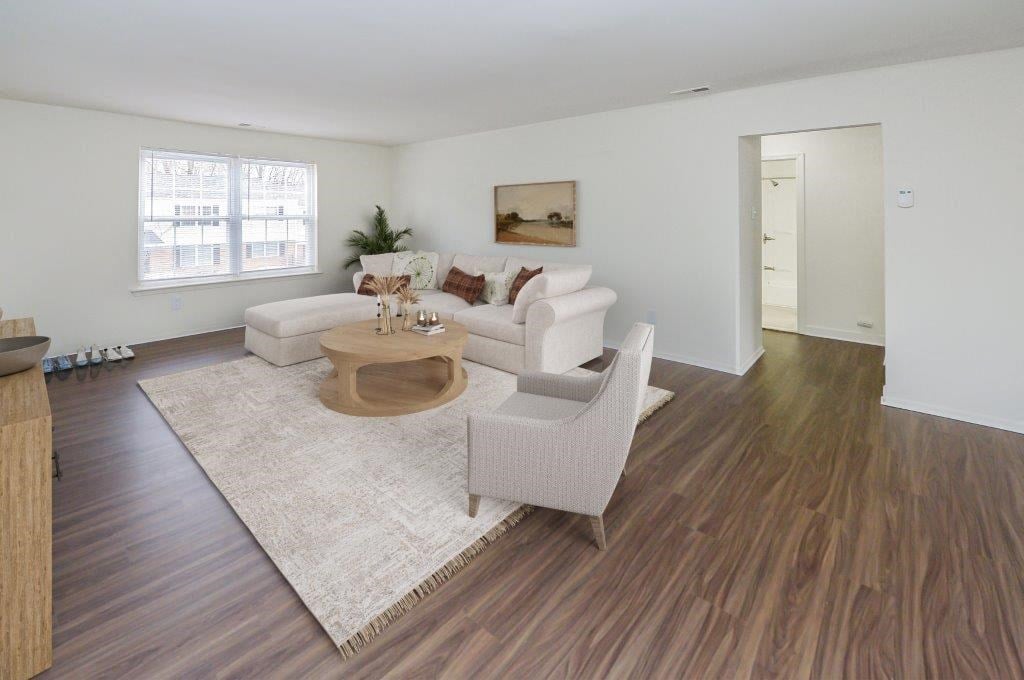 a living room with a couch and a table