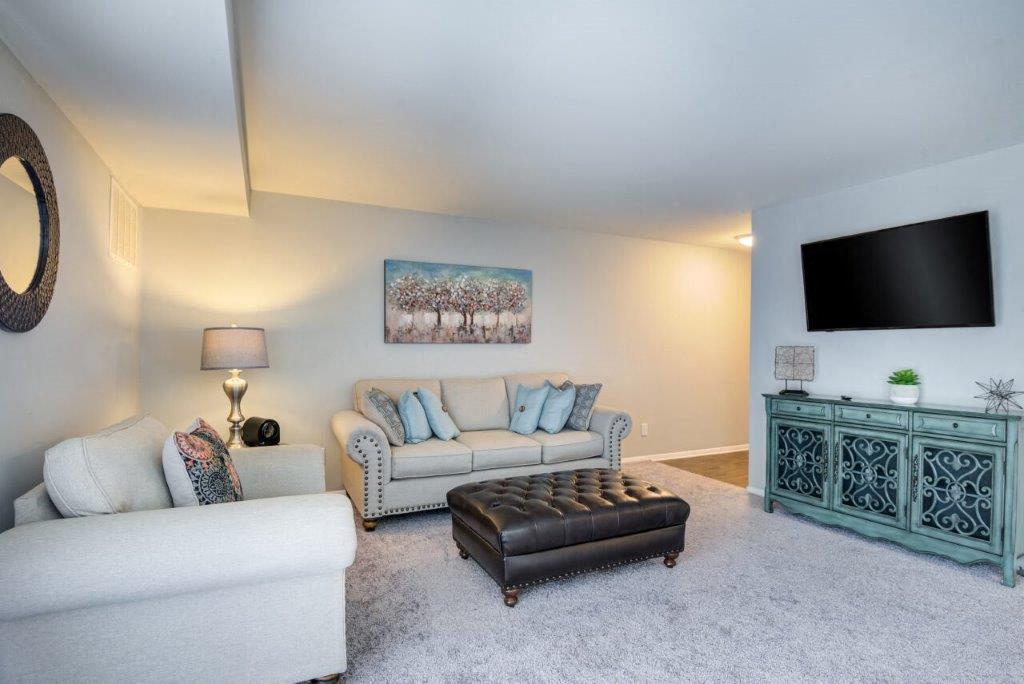 a living room with a couch and a television