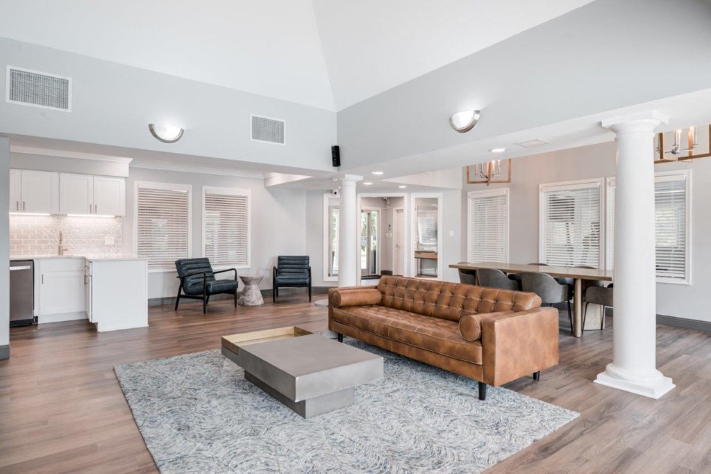 a living room with a couch and a table