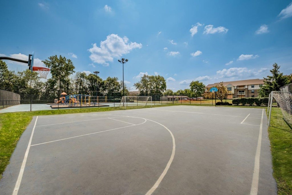 the basketball court at the apartments for rent
