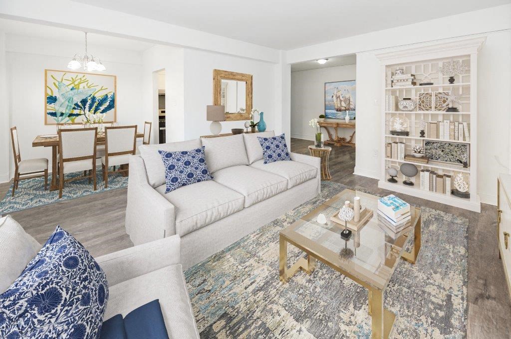 a living room with a couch and a table