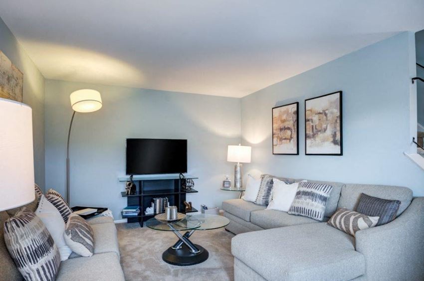 a living room with a couch and a television