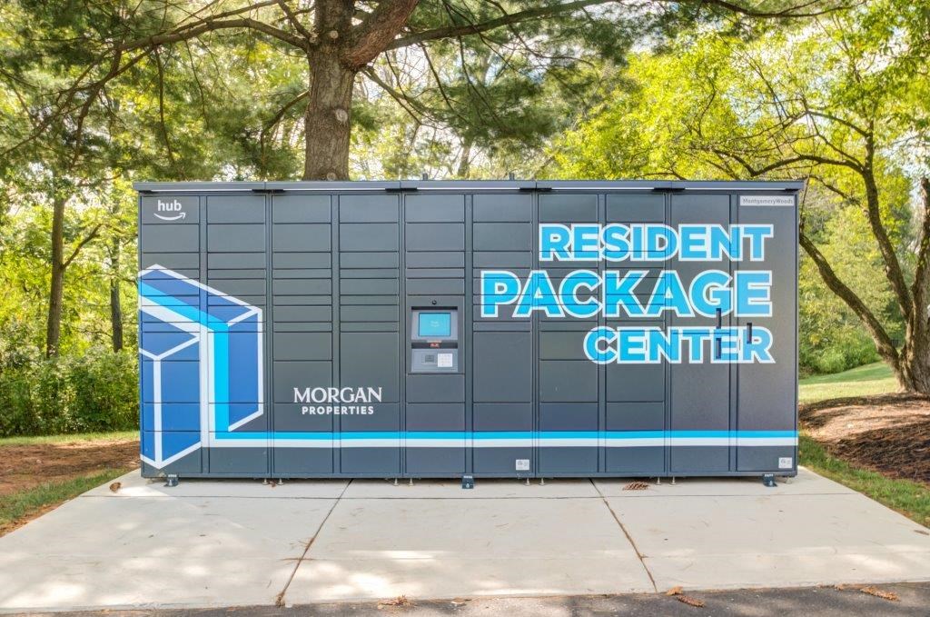 a container with a sign on the side of a sidewalk