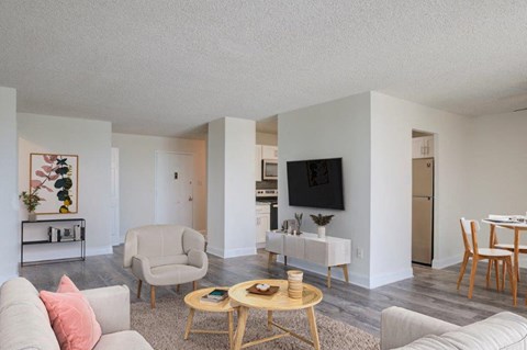 a living room with a couch and a table