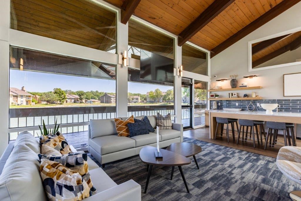 a living room with a couch and a table